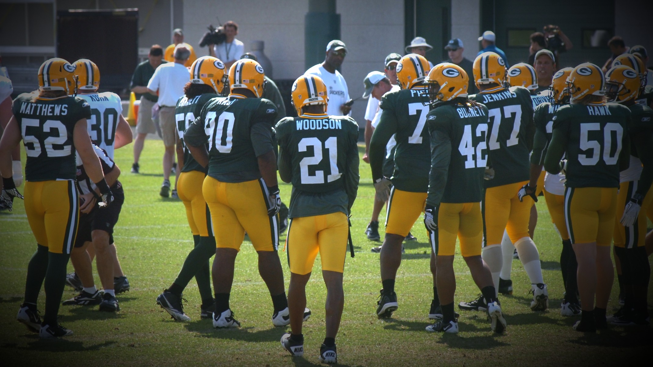 Charles Woodson, 21, huddles with teammates at the end of training camp in 2010. The Packers would go on to finish the season as Super Bowl XLV champions. Dan Plutchak photo