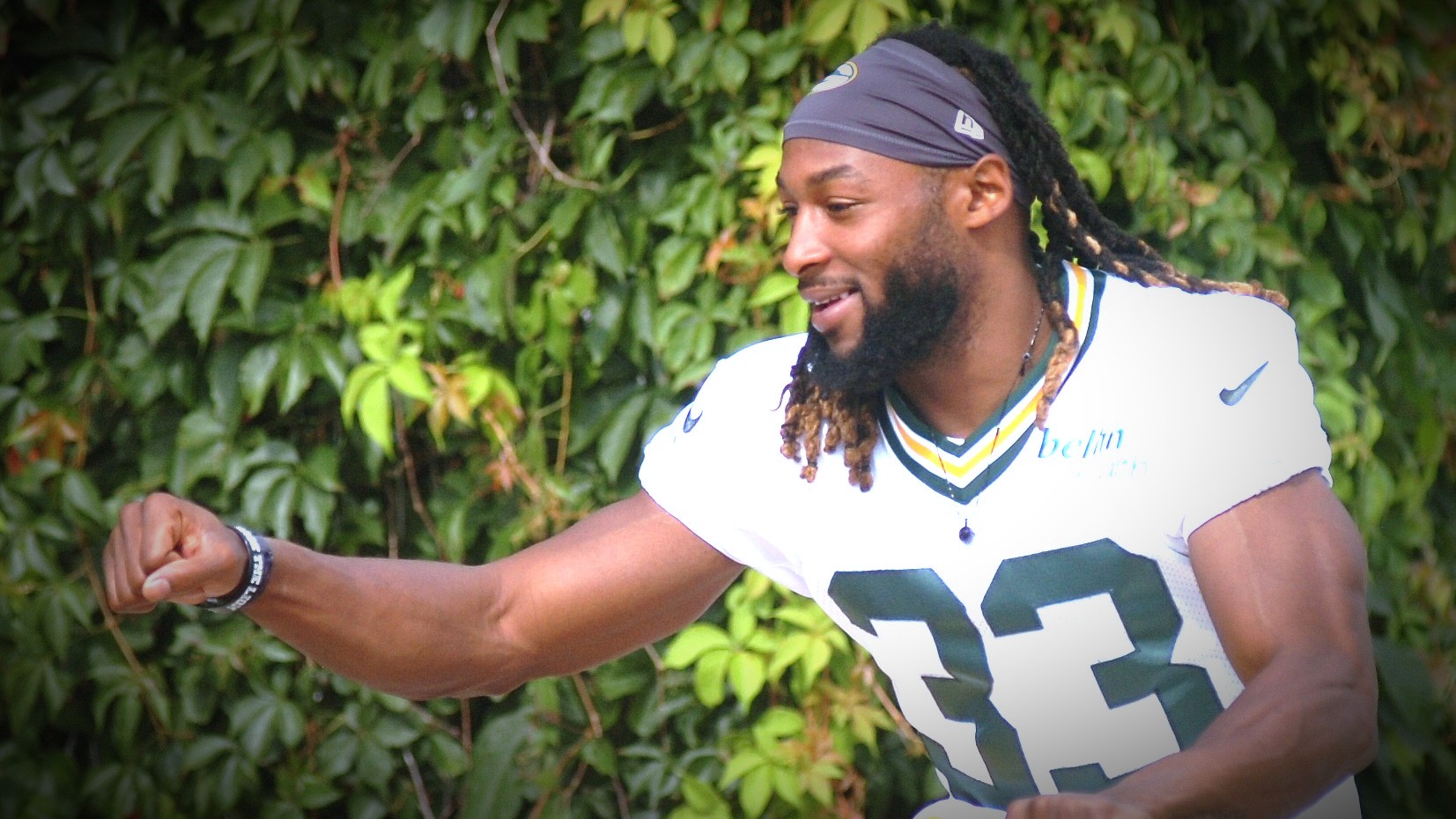 Packers' running back Aaron Jones fist bumps a teammate prior to practice during the 2021 training camp. Dan Plutchak photo